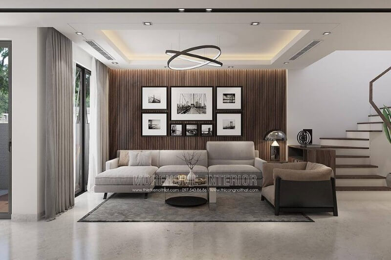 Cửa sổ với rèm 2 lớp luôn là lựa chọn ưu tiên vừa tận dụng tối đa ánh sáng vừa chắn nắng một cách hữu hiện cho phòng khách. Thiết kế phòng khách biệt thự
